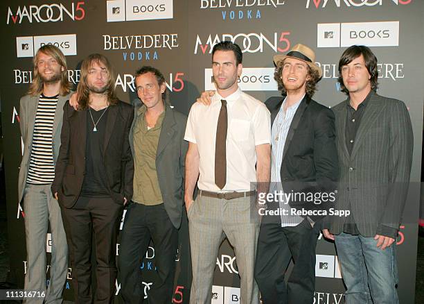 Maroon 5 and photographer Christopher Wray-McCann during Maroon 5 Launches Their Book "Midnight Miles" at Miau Haus Art Studio in Los Angeles,...