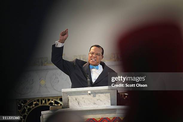 Minister Louis Farrakhan, leader of the Nation of Islam, gets a standing ovation from his followers as he makes a point while speaking at a press...