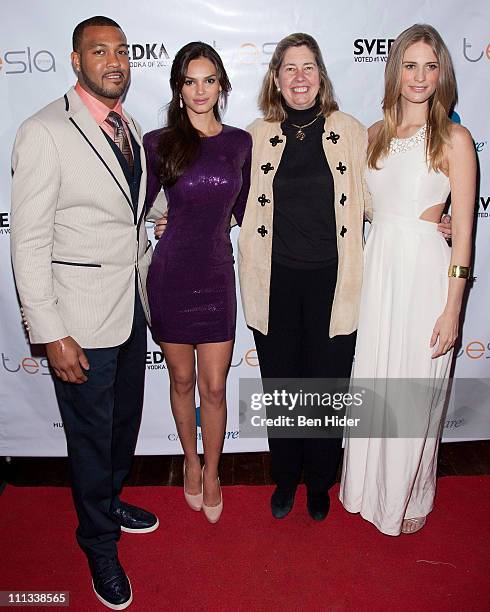 Michael Clayton of the New York Giants, Model Lisalla Montenegro, CEO of CancerCare Helen Miller and Sports Illustrated Swimsuit Model Julie...