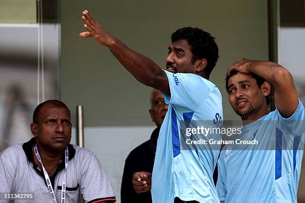 Former player Aravinda de Silva , Muttiah Muralidaran and Tillekeratne Dilshan of Sri Lanka outside the dressing rooms at training at Wankhede...