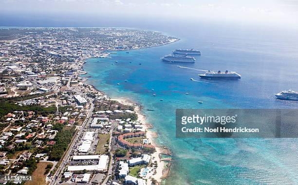 aerial view of downtown georgetown and cruiseships - georgetown imagens e fotografias de stock
