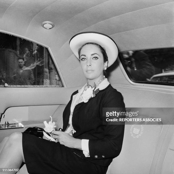 Actress Elizabeth Taylor in a car in the 1960's in Paris, France.