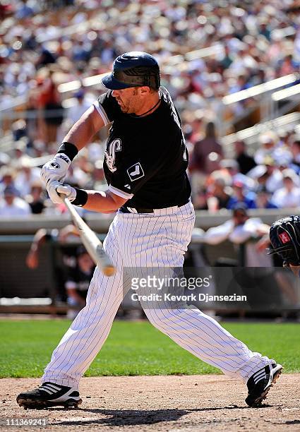 Dallas McPherson of the Chicago White Sox plays against Chicago Cubs during the spring training baseball game at Camelback Ranch on March 11, 2011 in...