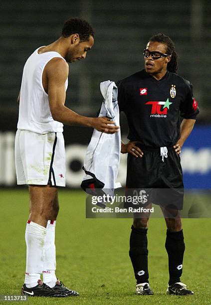 Former team-mates Thierry Henry of Arsenal swaps shirts with Edgar Davids of Juventus after the UEFA Champions League Second Stage Group D match...