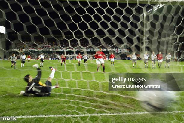 David Beckham of Manchester United scores the third goal of the match from the penalty spot to give his side a convincing lead during the UEFA...