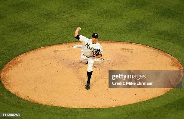 Josh Johnson of the Florida Marlins pitches during opening day against the New York Mets at Sun Life Stadium on April 1, 2011 in Miami Gardens,...