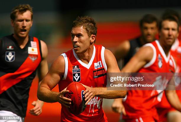 Jarrod McCorkell of the Bullants runs with the ball during the round one VFL match between the Northern Bullants and the Bendigo Bombers at Visy Park...