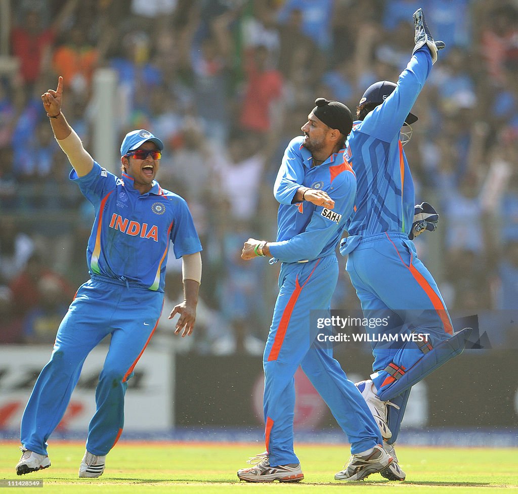 Indian spinner Harbhajan Singh (C) is co