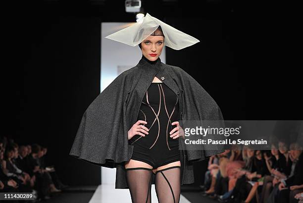 Model wears a creation by designers from Laboratoriya 13 on Day 3 of the Mercedes-Benz Fashion Week Russia Fall/Winter 2011/2012 at the Congress Hall...