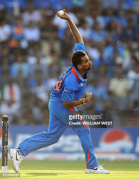 Indian fast bowler Zaheer Khan sends down a delivery to a Sri Lankan batsman during the ICC Cricket World Cup 2011 final match at The Wankhede...