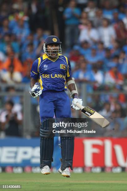 Mahela Jayawardena of Sri Lanka celebrates reaching his century during the 2011 ICC World Cup Final between India and Sri Lanka at Wankhede Stadium...