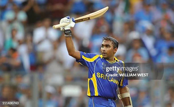 Sri Lankan batsman Mahela Jayawardene celebrates scoring his century against India during the ICC Cricket World Cup 2011 final played at The Wankhede...