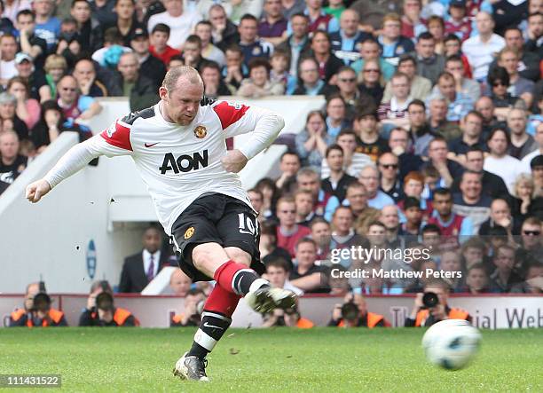 Wayne Rooney of Manchester United scores their third goal during the Barclays Premier League match between West Ham United and Manchester United at...