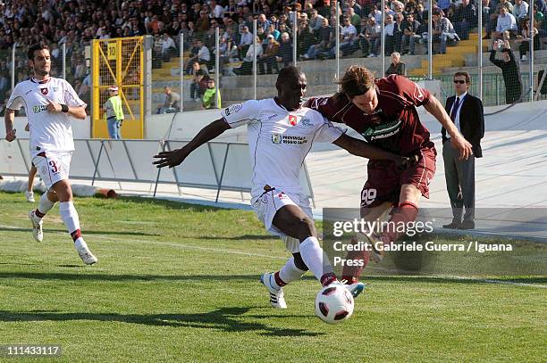 Federico Gerardi of Portogruaro competes with Daniel Adejo of Reggina during the Serie B match between Portogruaro and Reggina at P. G. Mecchia...