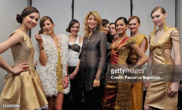 Designer Gulnara Karimova backstage with models ahead of her show on Day 3 of the Mercedes-Benz Fashion Week Russia Fall/Winter 2011/2012 at the...