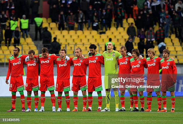 Players of FC Lokomotiv Moscow squad line up ahead of the Russian Football League Championship match between FC Lokomotiv Moscow and FC Rostov...