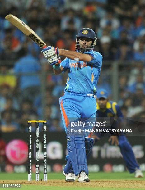 Indian cricketer Yuvraj Singh plays a shot during the ICC Cricket World Cup 2011 final match between India and Sri Lanka at The Wankhede Stadium in...