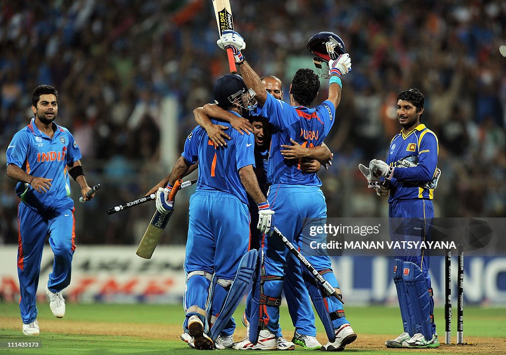 Indian cricketers celebrate after beatin