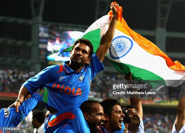 Sachin Tendulkar of India celebrates his teams win during the 2011 ICC World Cup Final between India and Sri Lanka at the Wankhede Stadium on April...