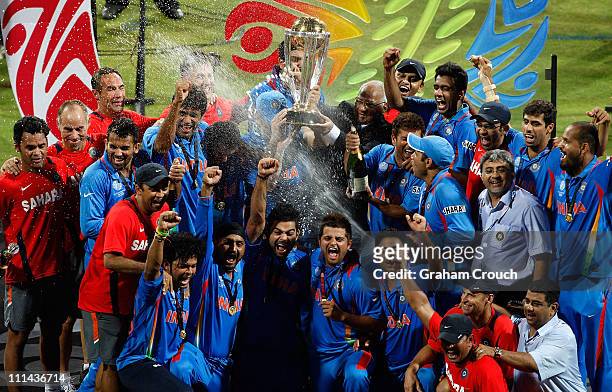 India players Yuvraj Singh, Virat Kohli and Dr Nitin Patel celebrate with the trophy after India defeated Sri Lanka a in the 2011 ICC World Cup Final...