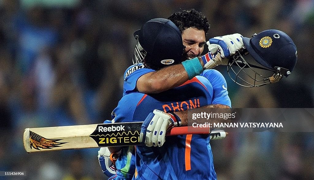 Indian cricketer Yuvraj Singh (R) and ca