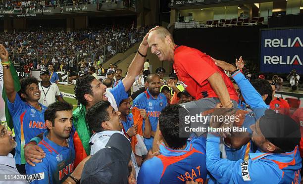 Gary Kirsten coach of India celebrates with his team after the 2011 ICC World Cup Final between India and Sri Lanka at Wankhede Stadium on April 2,...