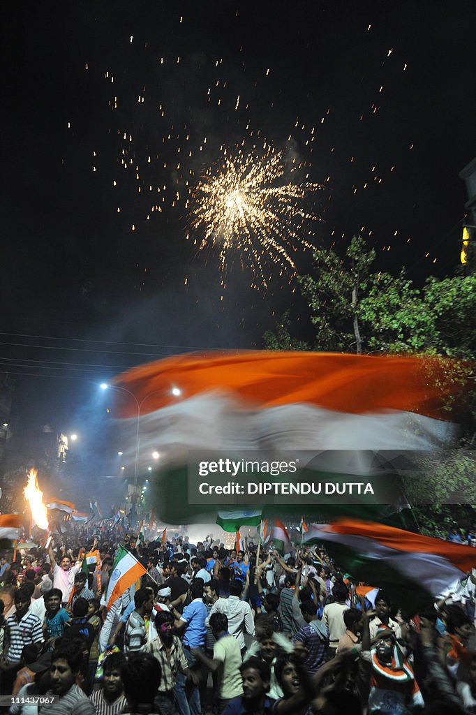 Indian cricket fans celebrate victory ov