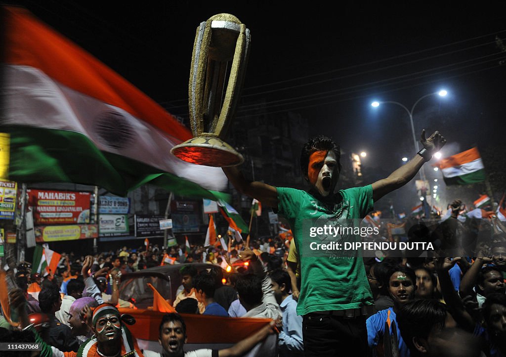 Indian cricket fans celebrate victory ov