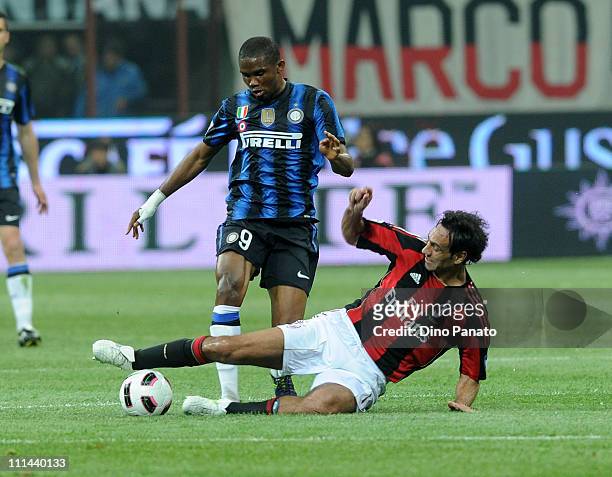 Samuel Eto'o of FC Inter competes with Alessandro Nesta of AC Milan during the Serie A match between AC Milan and FC Internazionale Milano at Stadio...