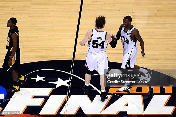 Matt Howard and Shelvin Mack of the Butler Bulldogs celebrate after defeating the Virginia Commonwealth Rams during the National Semifinal game of...