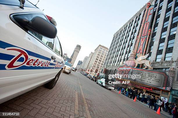 Detroit Police provide traffic control at the Fox Theatre in Detroit, Michigan on April 2, 2011 to start his show "Violent Torpedo of Truth/Defeat is...