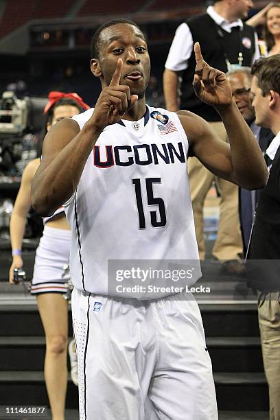 Kemba Walker of the Connecticut Huskies celebrates after defeating the Kentucky Wildcats during the National Semifinal game of the 2011 NCAA Division...