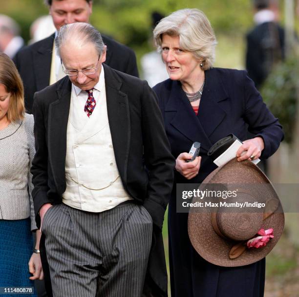 Sir Robert Fellowes and Lady Jane Fellowes attend the wedding of William Duckworth-Chad and Lucy Greenwell at All Saints Church, Sudbourne on April...