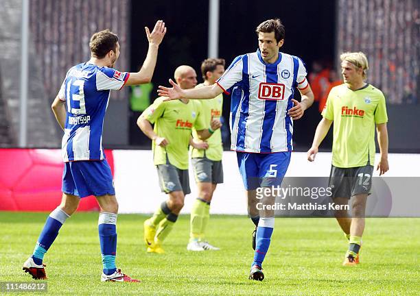 Andre Mijatovic of Berlin jubilates with team mate Nikita Rukavytsya after scoring the second goal during the Second Bundesliga match between Hertha...