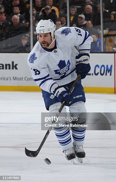 Mike Brown of the Toronto Maple Leafs skates with the puck against the Boston Bruins at the TD Garden on March 31, 2011 in Boston, Massachusetts.