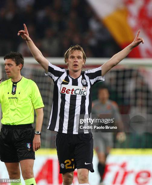 Milos Krasic of Juventus FC celebrates after scoring the opening goal during the Serie A match between AS Roma and Juventus FC at Stadio Olimpico on...