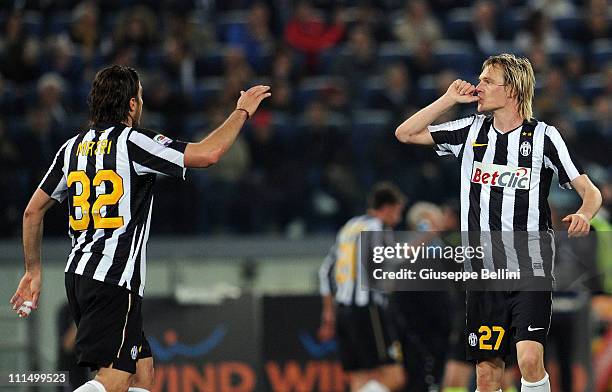 Alessandro Matri and Milos Krasic of Juventus celebrate after scoring the opening goal during the Serie A match between AS Roma and Juventus FC at...