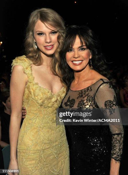 Singer Taylor Swift and Marie Osmond pose in the audience at the 46th Annual Academy Of Country Music Awards held at the MGM Grand Garden Arena on...