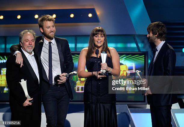 Producer Paul Worley, musicians Charles Kelley, Hillary Scott and Dave Haywood of the band Lady Antebellum accept the Album of the Year award for...