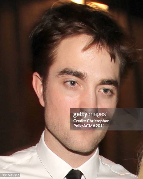 Actor Robert Pattinson poses backstage at the 46th Annual Academy Of Country Music Awards held at the MGM Grand Garden Arena on April 3, 2011 in Las...