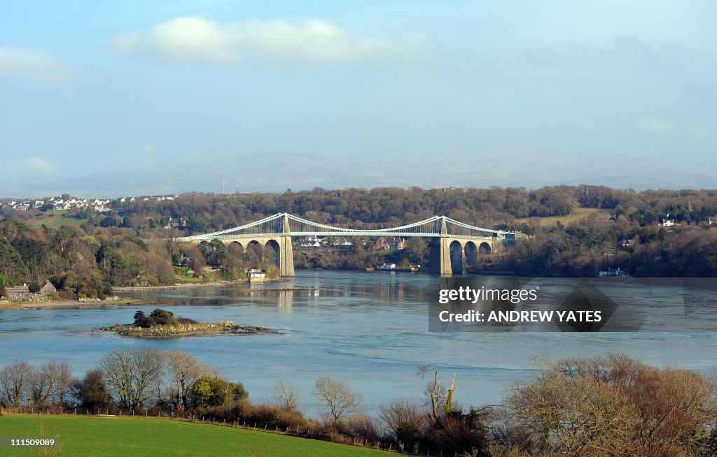 The Menai Suspension Bridge between the