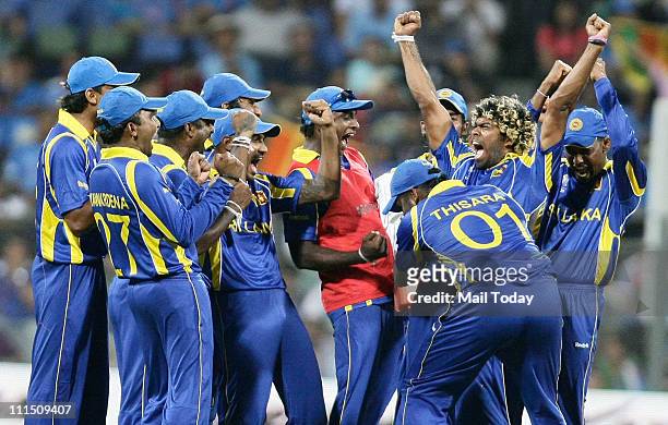 Sri Lankan Players celebrate the wicket of Sachin Tendulkar during the ICC Cricket World Cup 2011 Final match at The Wankhede Stadium in Mumbai on...