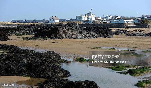 Houses overlook the beach near the RAF Valley in Anglesey on March 25, 2011. The island of Anglesey has about as many sheep as people, but it is...