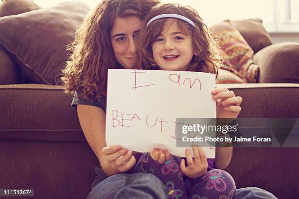 beautiful - holding sign stock pictures, royalty-free photos & images