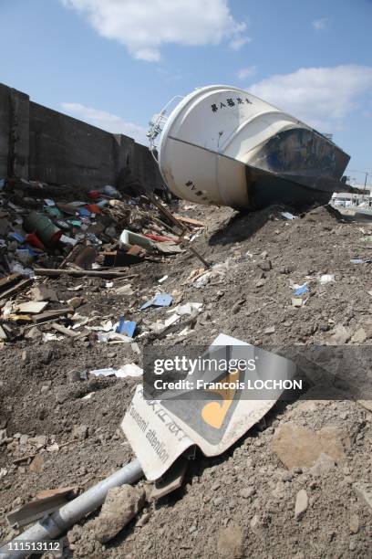 Tsunami warning sign sits on the ground April 3, 2011 in Myako City, Japan. The 9.0 magnitude strong earthquake struck offshore on March 11 at 2:46pm...