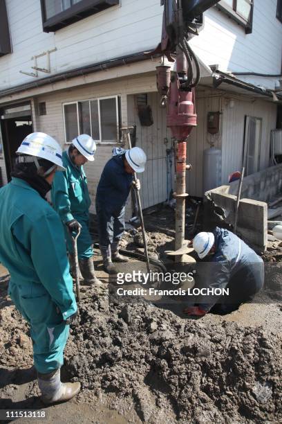 Men work among the debris April 3, 2011 in Myako City, Japan. The 9.0 magnitude strong earthquake struck offshore on March 11 at 2:46pm local time,...