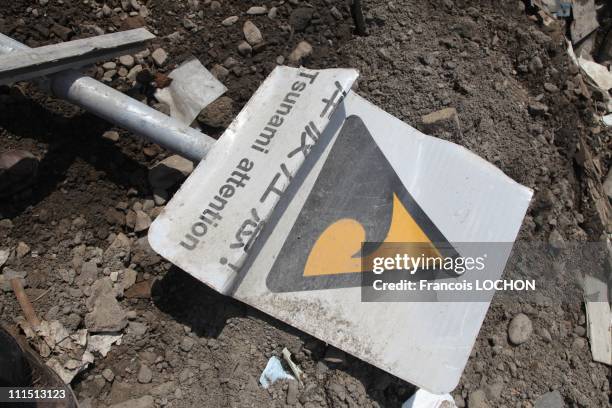 Tsunami warning sign sits on the ground April 3, 2011 in Myako City, Japan. The 9.0 magnitude strong earthquake struck offshore on March 11 at 2:46pm...