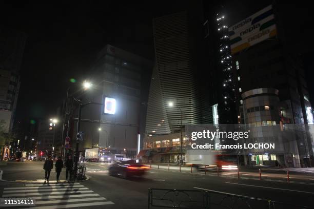 Most of he lights on Ginza Ave. Are darkened due to an energy saving program April 3, 2011 in Tokyo, Japan. The major shopping steeet Ginza Ave,...