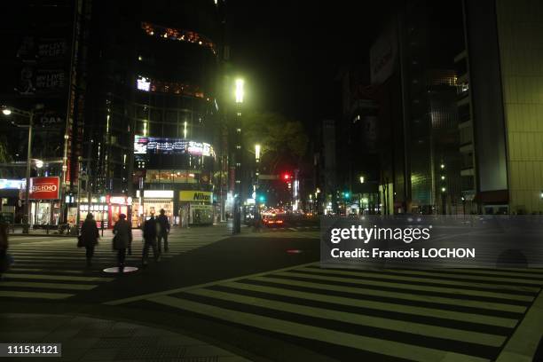 Most of he lights on Ginza Ave. Are darkened due to an energy saving program April 3, 2011 in Tokyo, Japan. The major shopping steeet Ginza Ave,...