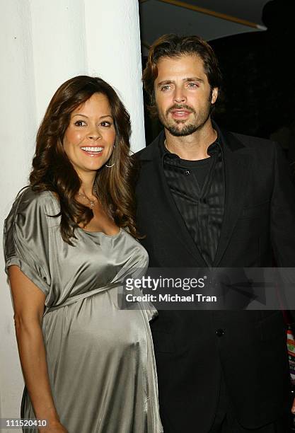 Personality Brooke Burke and actor David Charvet arrive at the Los Angeles premiere of "The Business of Being Born" held at the Fine Arts Theatre on...